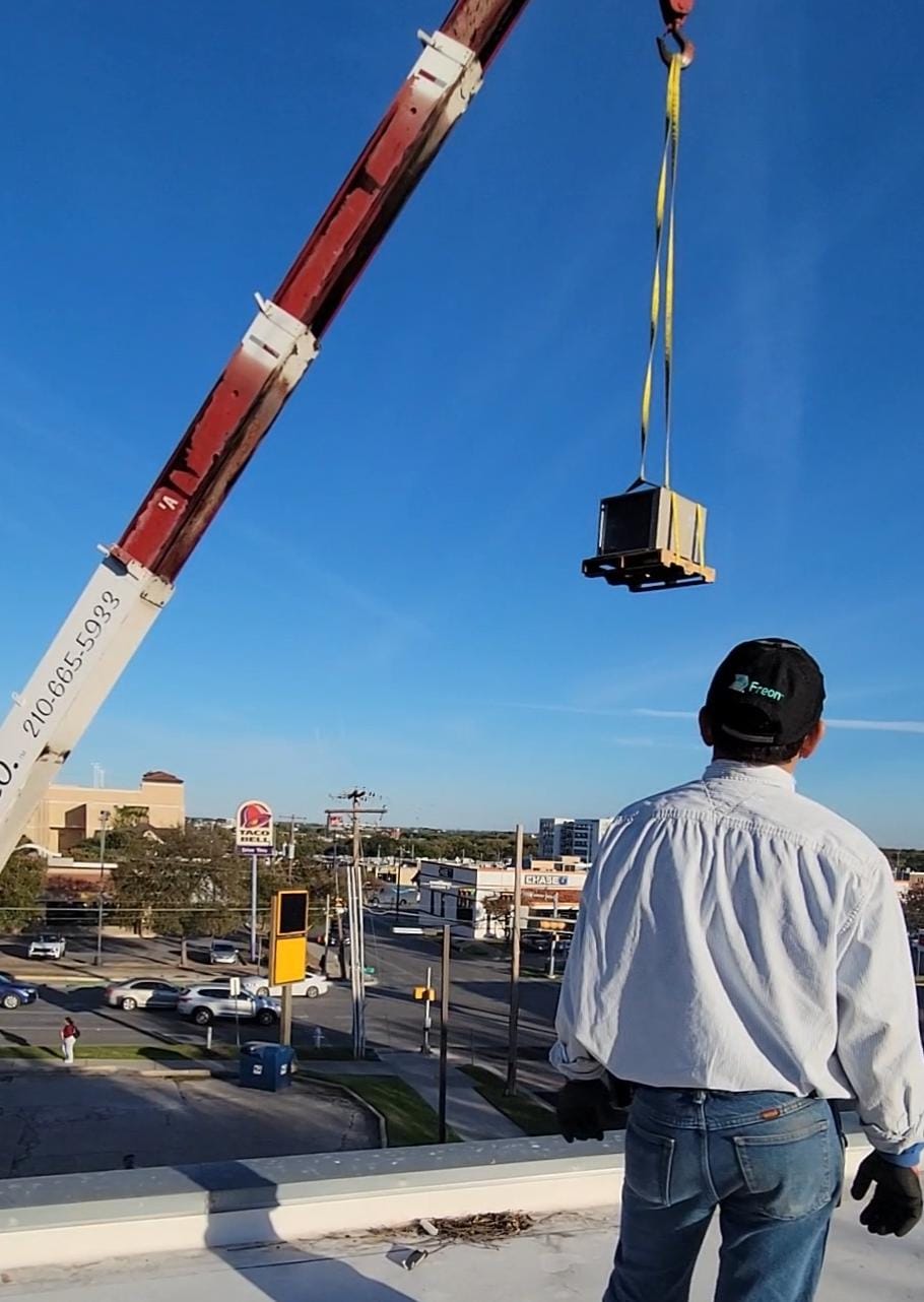 Commercial HVAC crane lift in Houston