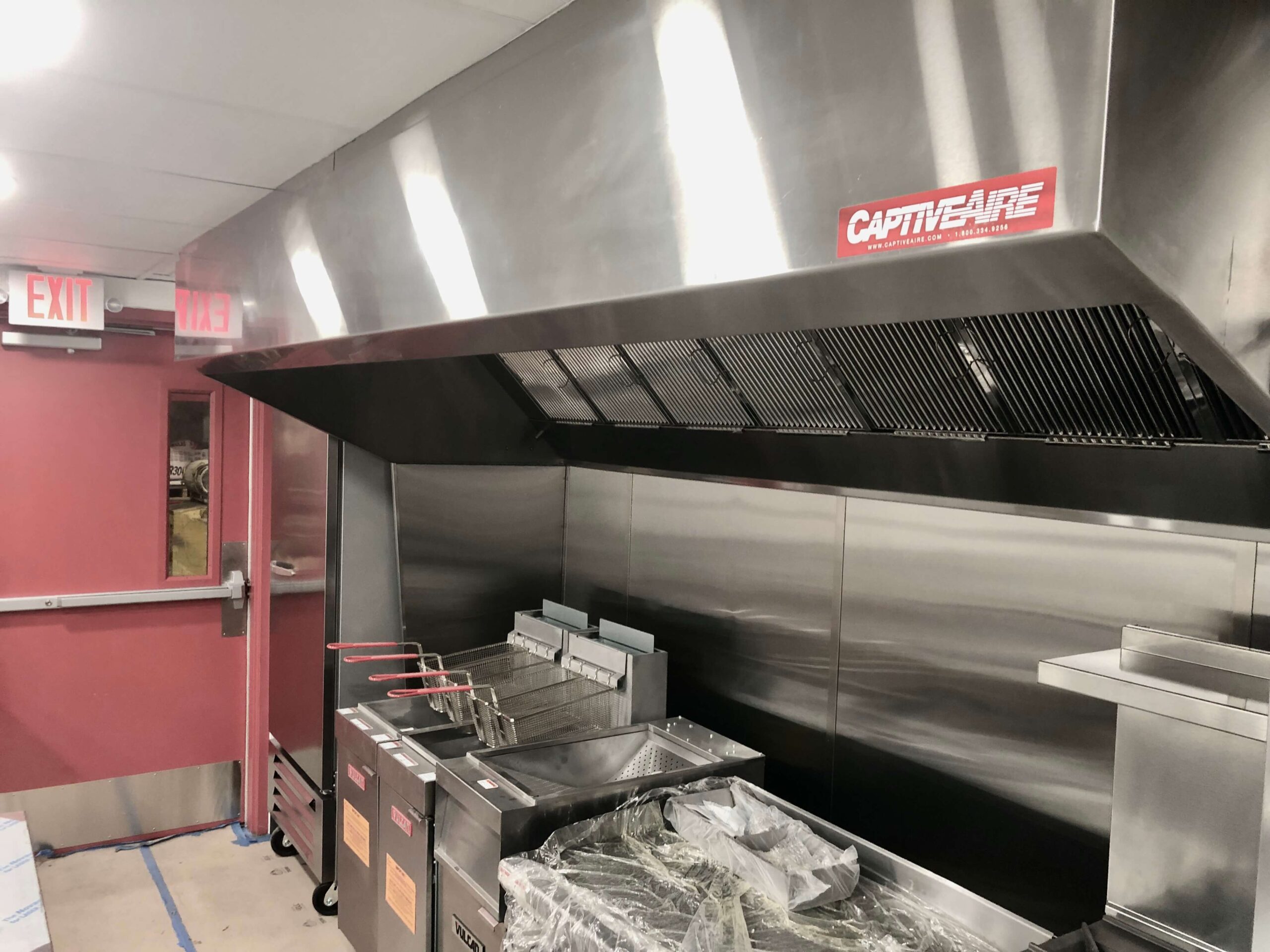 Restaurant vent hood installation for tenant buildout in Houston